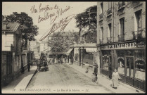 12 - Boulogne-sur-Seine - La rue de la Mairie, Boulogne-Billancourt. rue de l'Ancienne Mairie . - perspectiveScène de rue.Au premier plan, à droite, une imprimerie. Au second plan, à gauche une hippomobile.