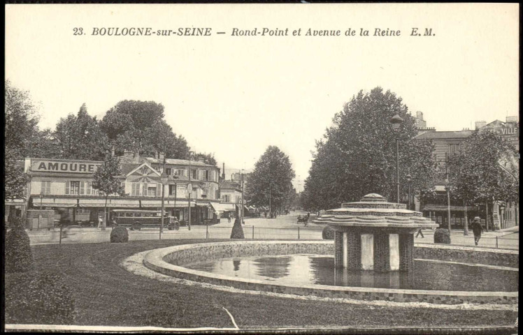 23 - Boulogne-sur-Seine - Rond Point et Avenue de la Reine, Boulogne-Billancourt. rond point Rhin-et-Danube et route de la Reine . - vue généraleVue au premier plan sur le rond point Rhin-et-Danube, au second plan à gauche, un bus devant le café Amourette et une boulangerie, en face la route de la Reine.