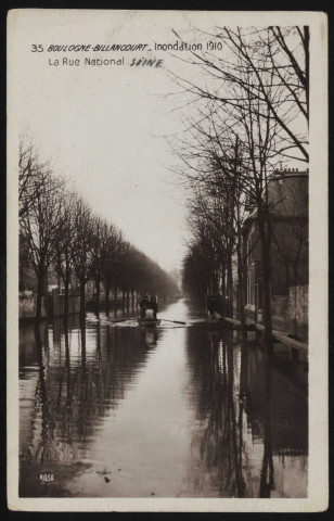 35 - Boulogne-Billancourt - Inondation 1910 - la Rue Nationale, Boulogne-Billancourt . rue Nationale . - Crue de la Seine, janvier 1910La rue Nationale inondée. Au second plan, une embracation transporte des sinistrés.