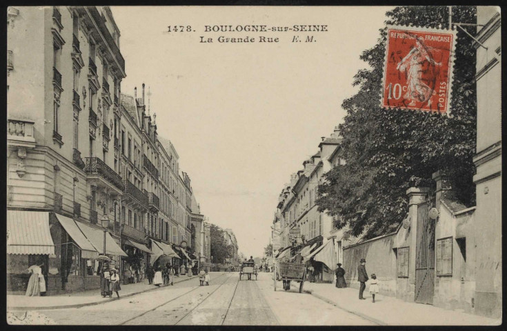 1478 - Boulogne-sur-Seine, La Grande-Rue, Boulogne-Billancourt . avenue Jean-Baptiste Clément . - perspectiveScène de rue. Au premier plan, à droite, un notaire. Au second plan, des commerces dont une boulangerie et une charcuterie