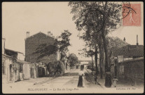 19 - Billancourt - La rue des Longs-Près, Boulogne-Billancourt. avenue Charles de Gaulle . - perspectiveAu premier plan, à gauche, une charrette pleine de foin. A droite, des femmes et des enfants.Au second plan, une hippomobile.